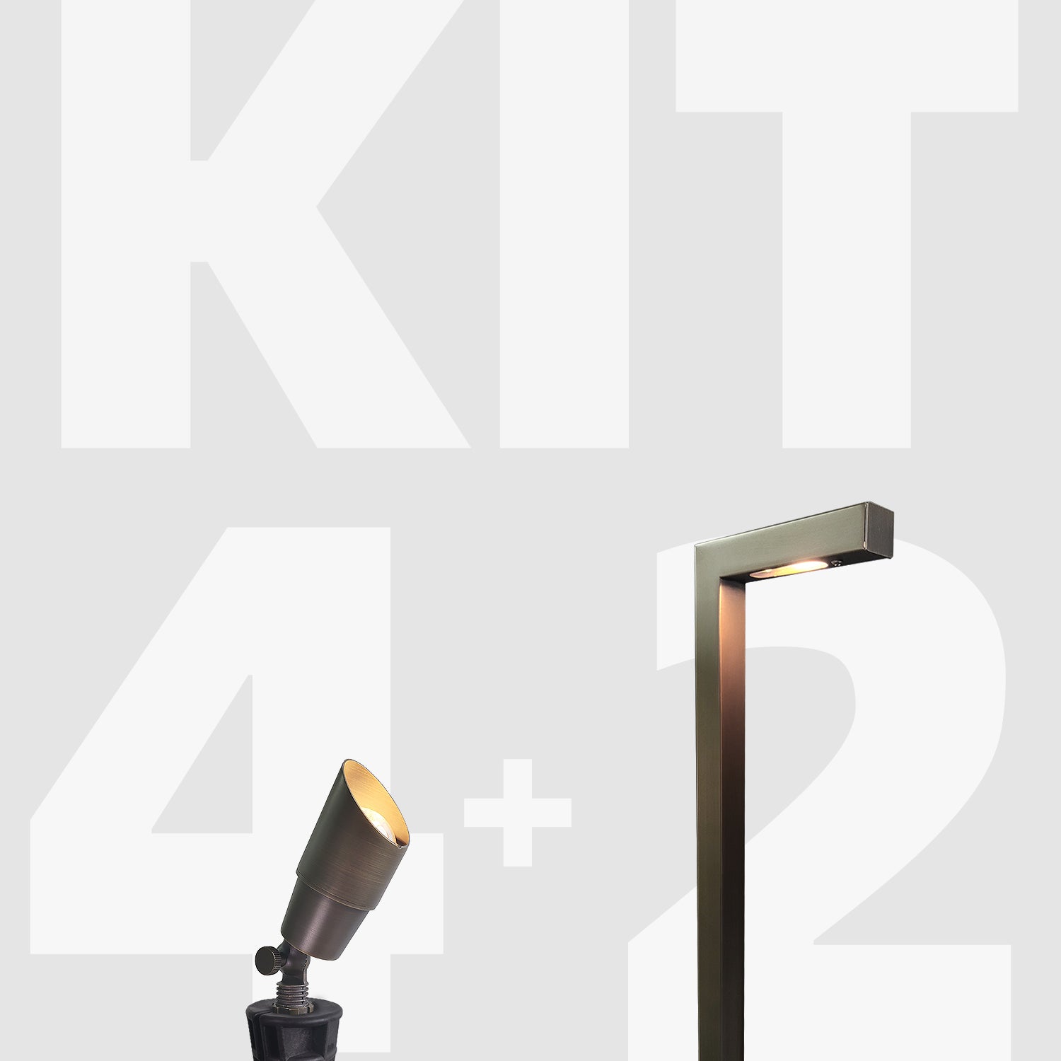 Brass finish low voltage LED landscape lighting kit with spotlight and path light on gray background